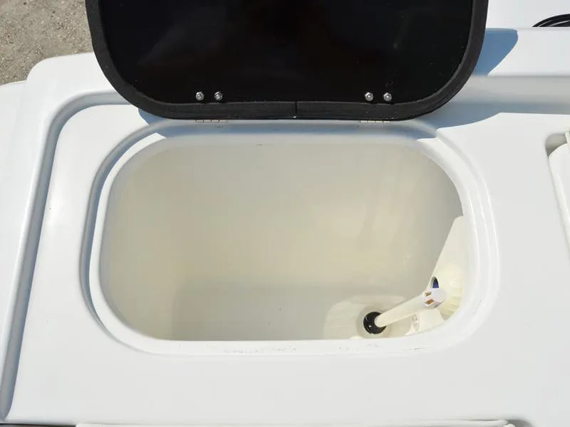 Slide: The Image of Open storage compartment of 2021 Clearwater 2305 CC boat. - 16