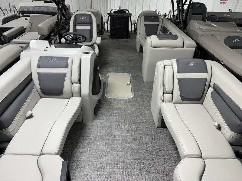 Slide: The Image of 2024 Barletta C22CC pontoon boat interior with luxurious seating and modern design. - 6