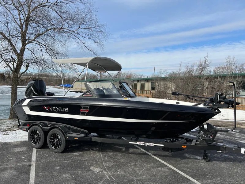 Slide: The Image of 2024 Vexus DVX 20S boat on trailer in parking lot. - 1