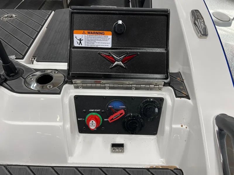 Slide: The Image of Control panel of 2024 Vexus DVX 20S boat with warning label. - 11
