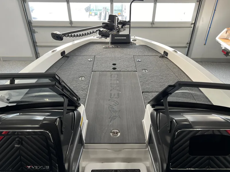 Slide: The Image of 2024 Vexus DVX 20S boat interior with advanced fishing equipment. - 30