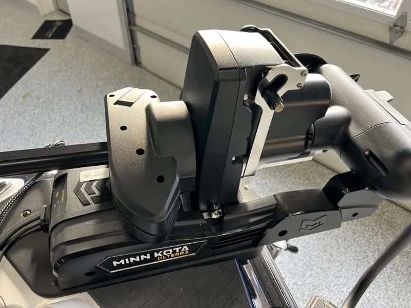 Slide: The Image of 2024 Vexus DVX 20S with Minn Kota Ultrex trolling motor in a garage. - 33