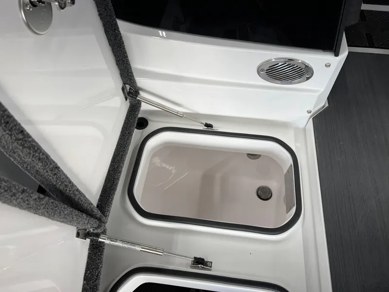 Slide: The Image of 2024 Vexus DVX 20S boat storage compartment with open hatch. - 37