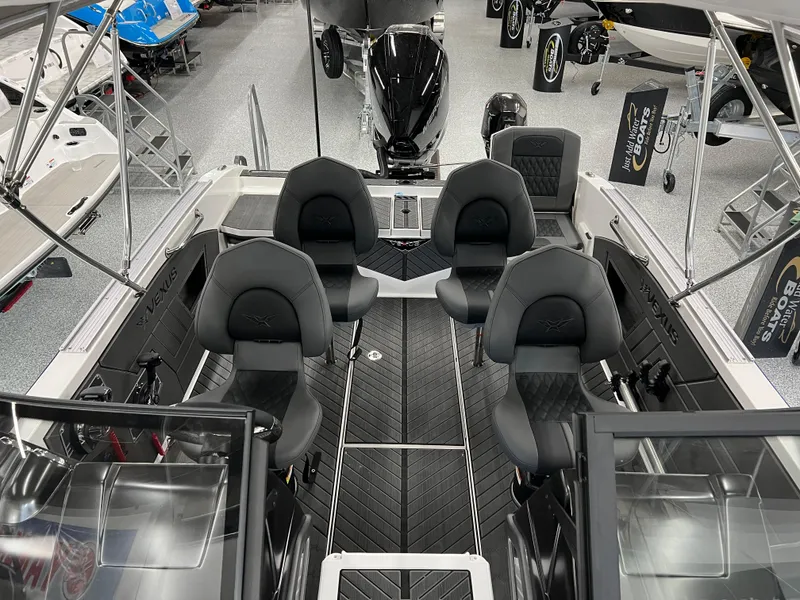 Slide: The Image of 2024 Vexus DVX 20S boat interior with four black seats and modern design. - 38