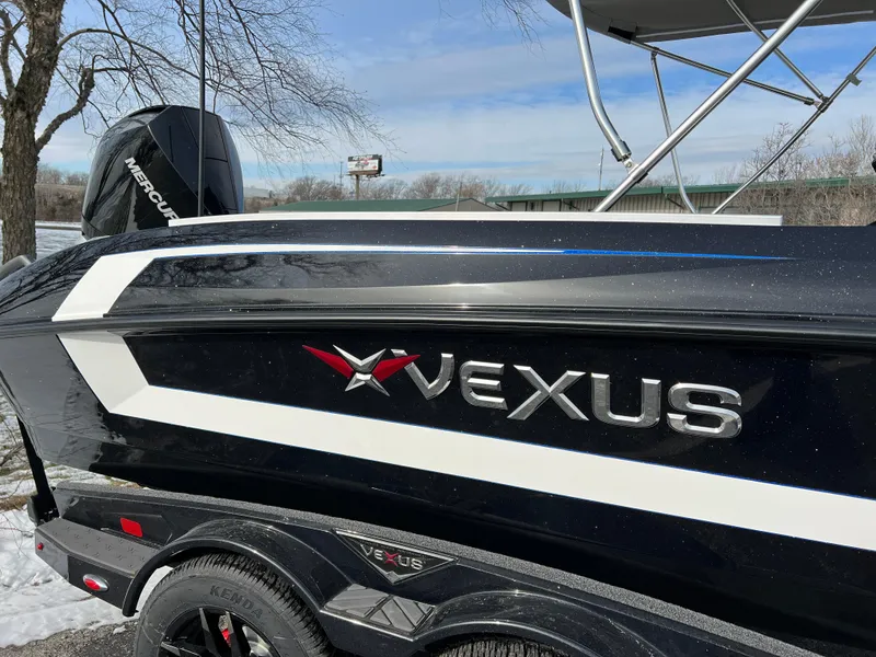 Slide: The Image of 2024 Vexus DVX 20S boat side view with logo and Mercury engine. - 4
