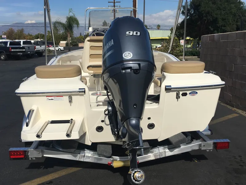 Slide: The Image of 2024 Scout 175 Sportfish boat with Yamaha 90 outboard motor, rear view. - 7