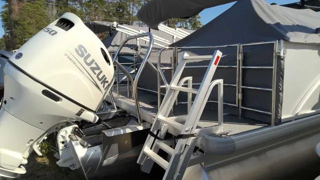 Slide: The Image of 2024 Sweetwater SW 2286 SFL pontoon boat with Suzuki outboard motor. - 11