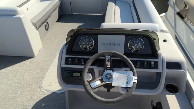 Slide: The Image of 2024 Sweetwater SW 2286 SFL boat dashboard with Garmin navigation system. - 7