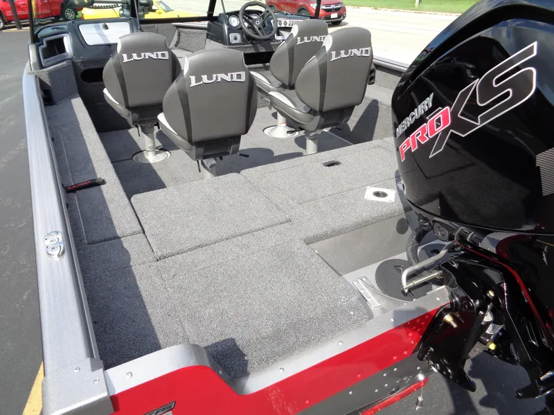 Slide: The Image of 2024 Lund 1875 Impact XS boat interior with Mercury Pro XS engine. - 26