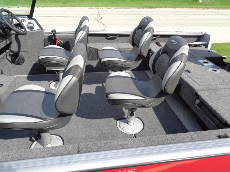 Slide: The Image of 2024 Lund 1875 Impact XS boat interior with four swivel seats. - 28