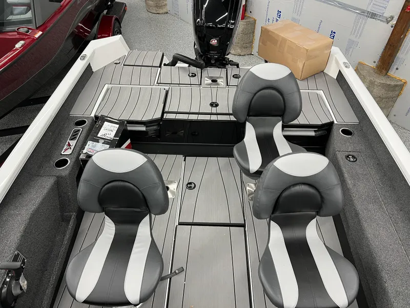Slide: The Image of 2024 Vexus ADX180 boat interior with two seats and a motor. - 19
