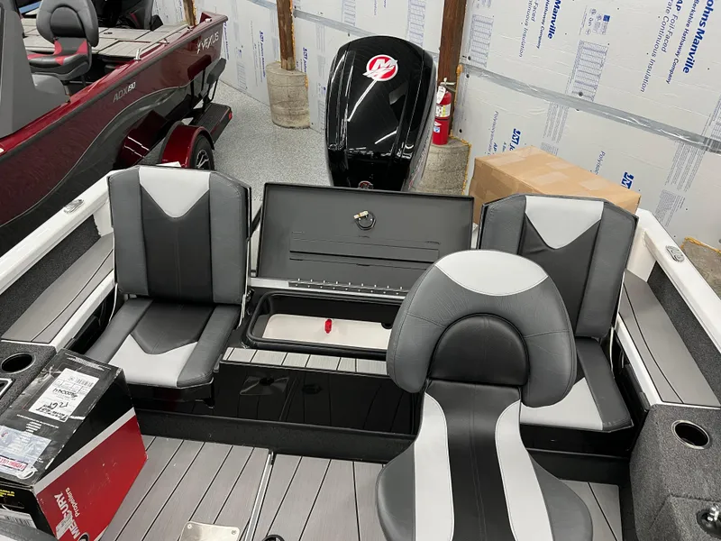 Slide: The Image of 2024 Vexus ADX180 boat interior with seating and storage compartments. - 22