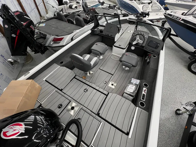 Slide: The Image of 2024 Vexus ADX180 fishing boat interior with seating and storage compartments. - 4