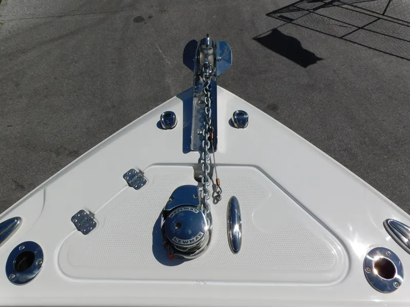 Slide: The Image of 2024 Sailfish 242 CC boat anchor and chain on deck. - 11