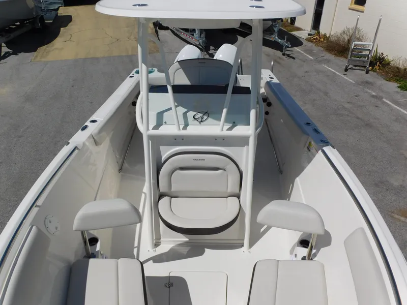 Slide: The Image of 2024 Sailfish 242 CC center console boat with seating and storage compartments. - 13