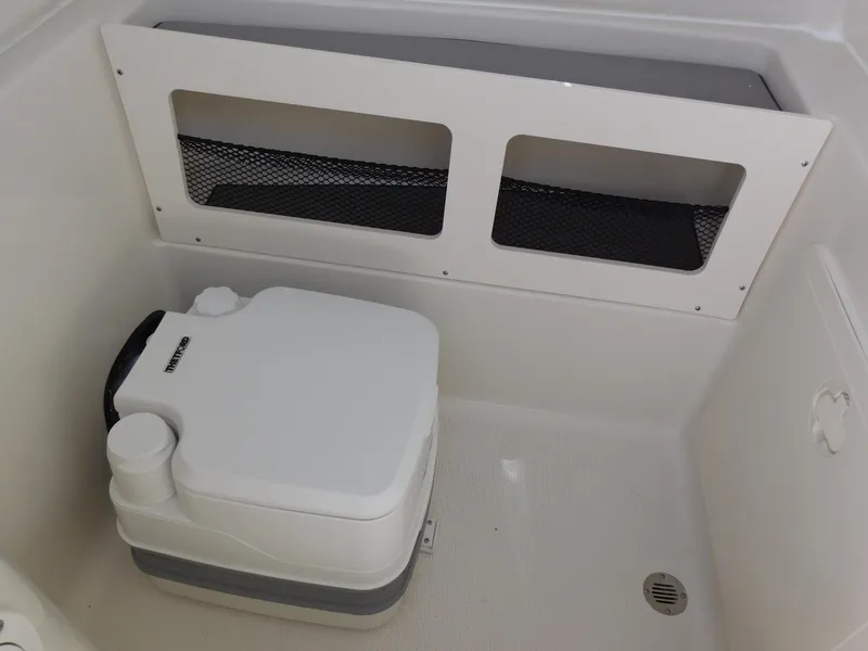 Slide: The Image of Portable toilet in 2024 Sailfish 242 CC boat. - 40