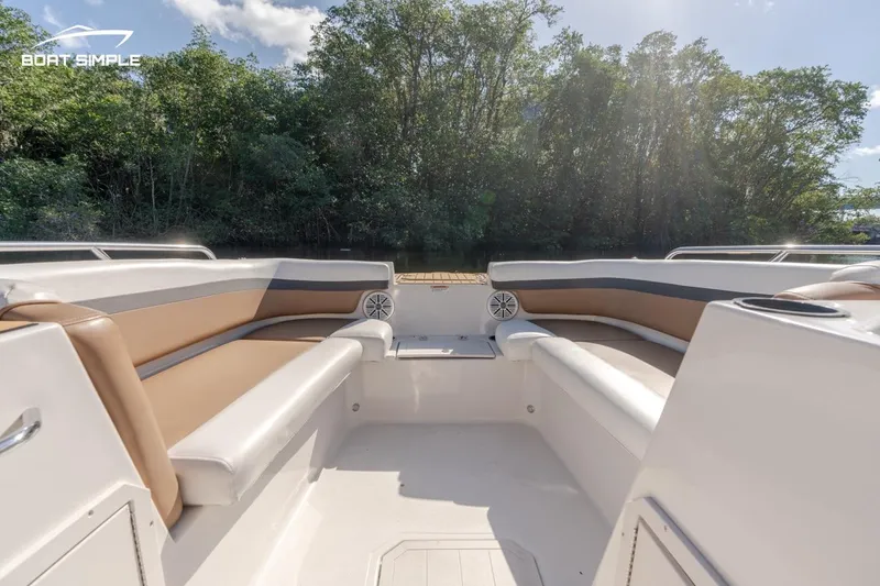 Slide: The Image of 2022 Starcraft SVX 191 OB boat interior with tan and white seating. - 4