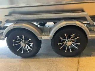 Slide: The Image of 2024 Spartan 200 Astoria trailer with dual axle wheels. - 9
