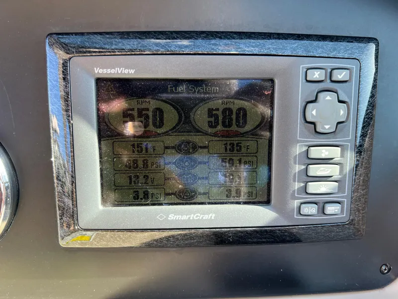 Slide: The Image of SmartCraft VesselView display on 2012 Sea Ray 300 SLX showing engine data. - 23