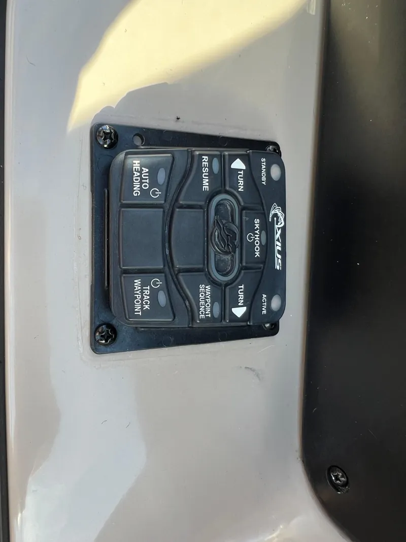 Slide: The Image of Control panel on a 2012 Sea Ray 300 SLX boat. - 26