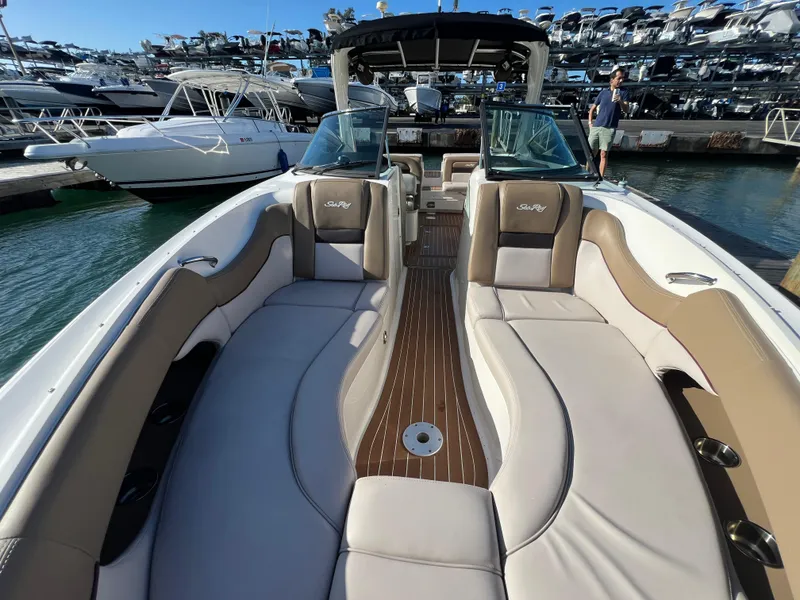 Slide: The Image of 2012 Sea Ray 300 SLX luxury boat interior at marina. - 33