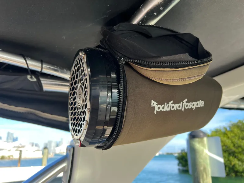 Slide: The Image of Rockford Fosgate speaker on 2012 Sea Ray 300 SLX boat, docked by the water. - 37