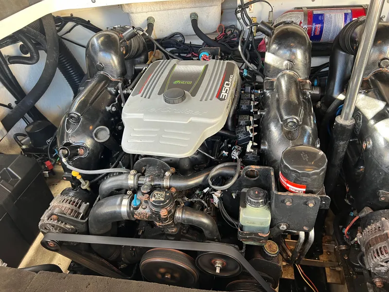 Slide: The Image of 2012 Sea Ray 300 SLX engine compartment with MerCruiser 350 MAG engine. - 44