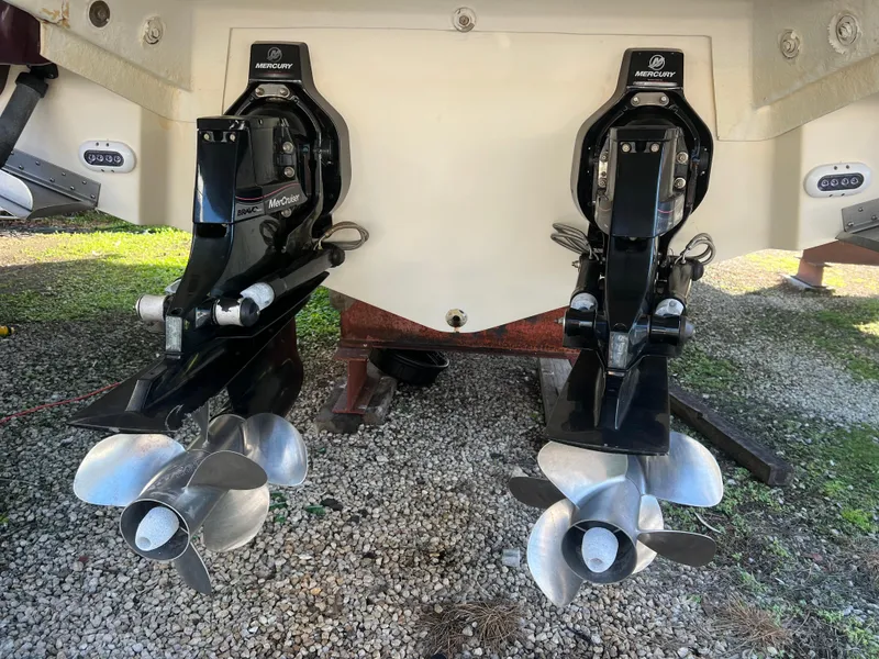 Slide: The Image of 2012 Sea Ray 300 SLX boat with dual Mercury outboard motors. - 47