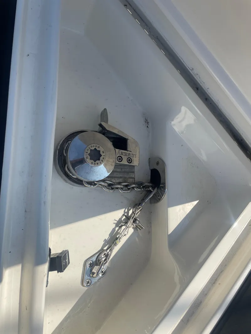 Slide: The Image of Anchor storage compartment on a 2008 Deep Impact 36di boat. - 23