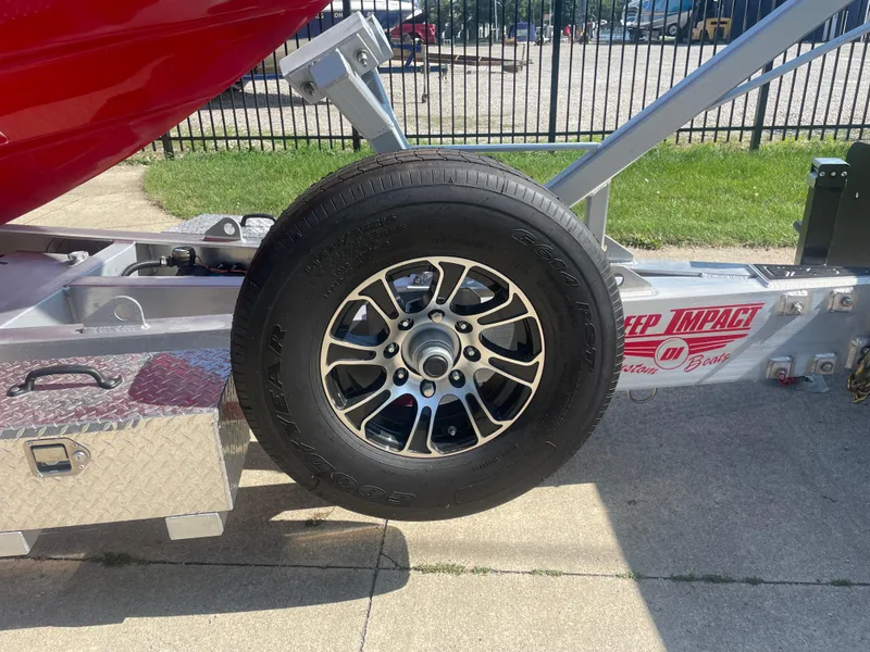 Slide: The Image of Close-up of a 2008 Deep Impact 36di boat trailer wheel and tire. - 30