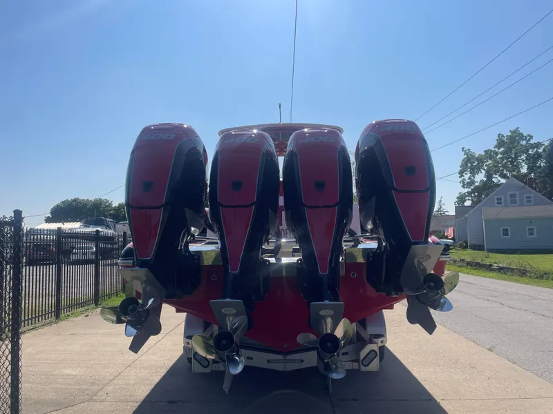 Slide: The Image of 2008 Deep Impact 36di boat with four powerful outboard motors. - 31