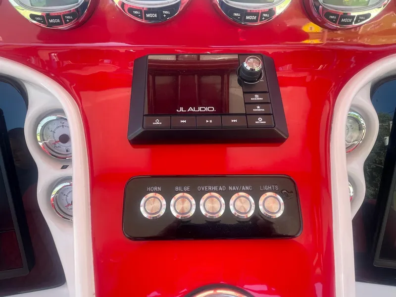 Slide: The Image of Control panel of a 2008 Deep Impact 36di boat with JL Audio system. - 32