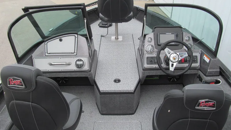 Slide: The Image of 2024 Ranger VS1782SC Reata boat interior with steering console and seating. - 5