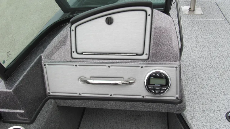 Slide: The Image of 2024 Ranger VS1782SC Reata boat dashboard with storage compartment and control panel. - 7