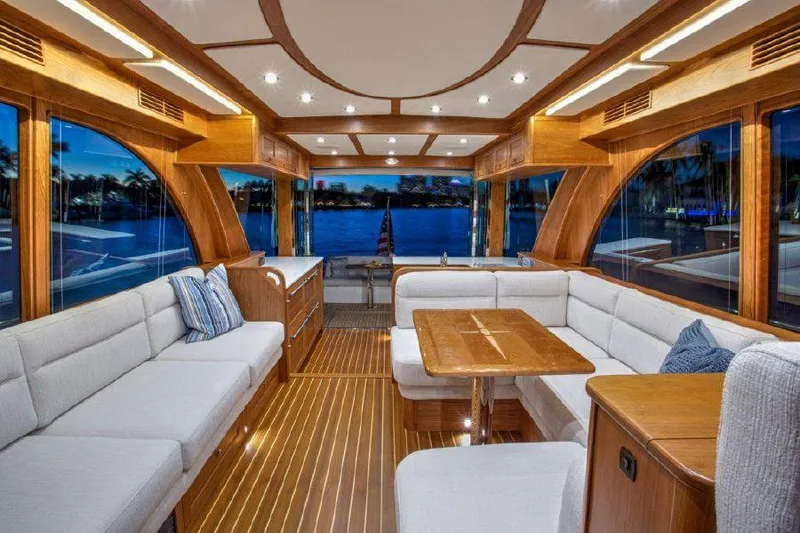 Slide: The Image of Luxurious interior of the 2025 Sabre 58 Salon Express yacht with waterfront view. - 8