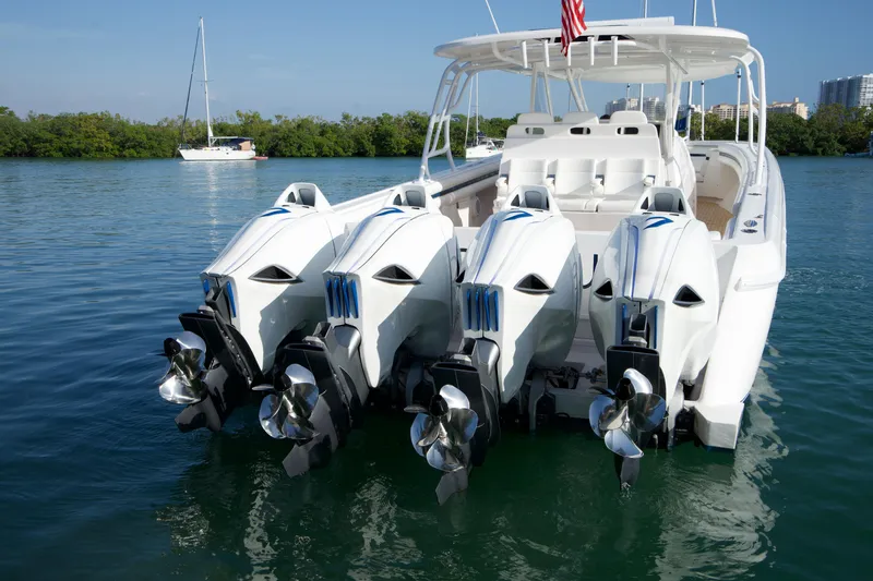 Slide: The Image of 2016 Intrepid 475 Panacea boat with quad outboard engines on water. - 3