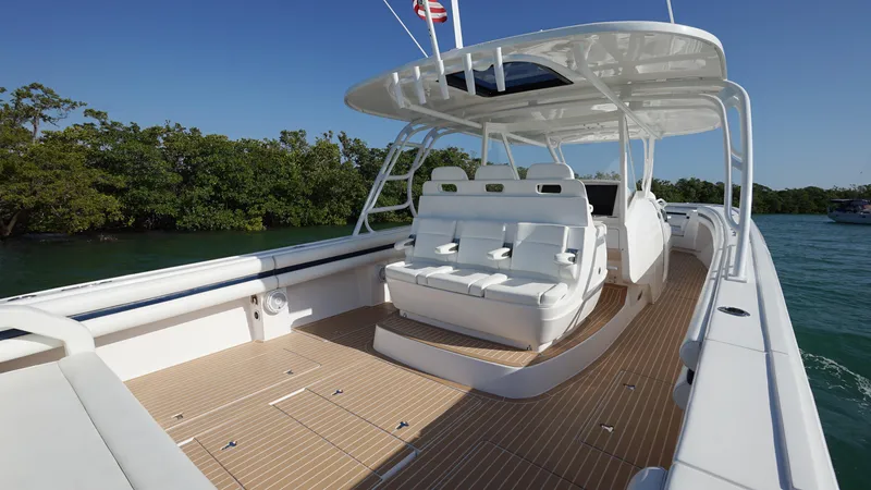 Slide: The Image of 2016 Intrepid 475 Panacea boat with spacious deck and seating. - 7
