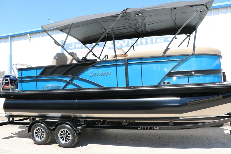 The Image of 2025 Sylvan Mirage X3 Party Fish pontoon boat on trailer. - 0