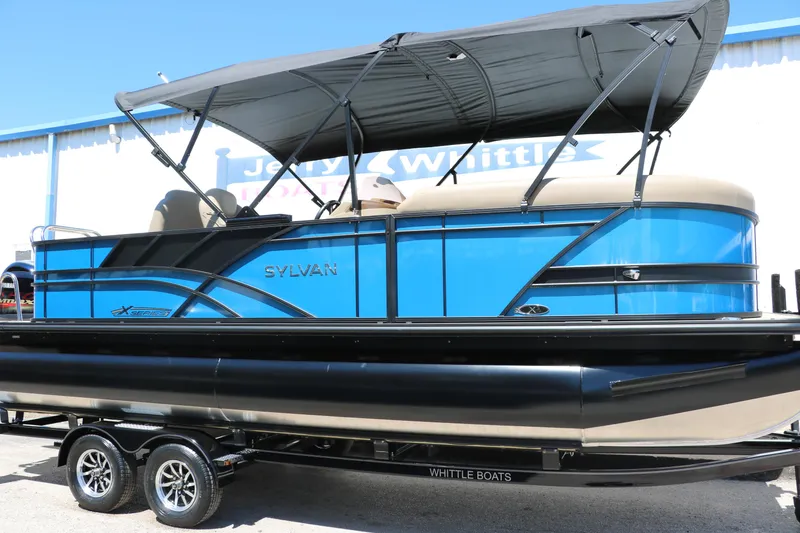 Slide: The Image of 2025 Sylvan Mirage X3 Party Fish pontoon boat with canopy on trailer. - 16