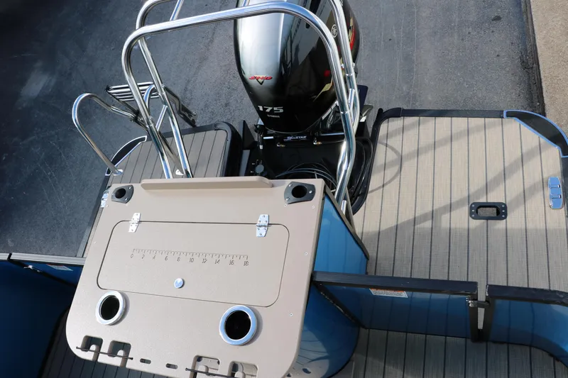 Slide: The Image of 2025 Sylvan Mirage X3 Party Fish boat with 175 HP engine, rear deck view. - 24