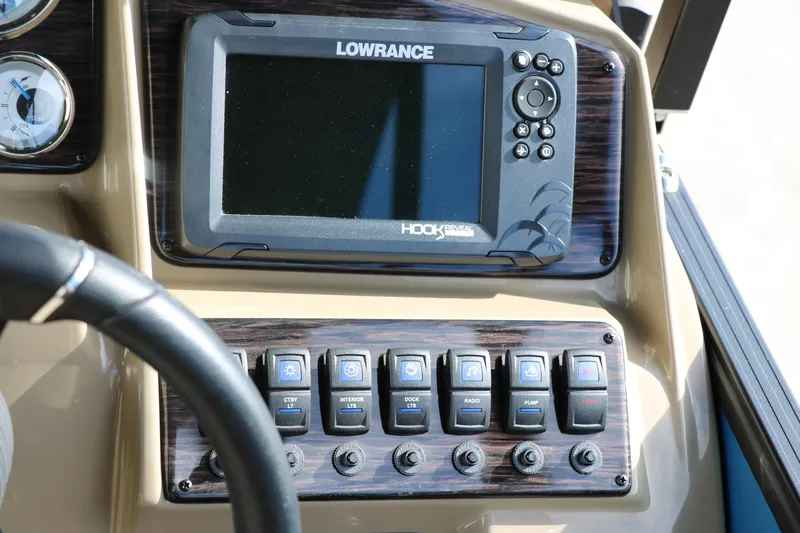 Slide: The Image of Control panel of 2025 Sylvan Mirage X3 Party Fish with Lowrance Hook GPS. - 30