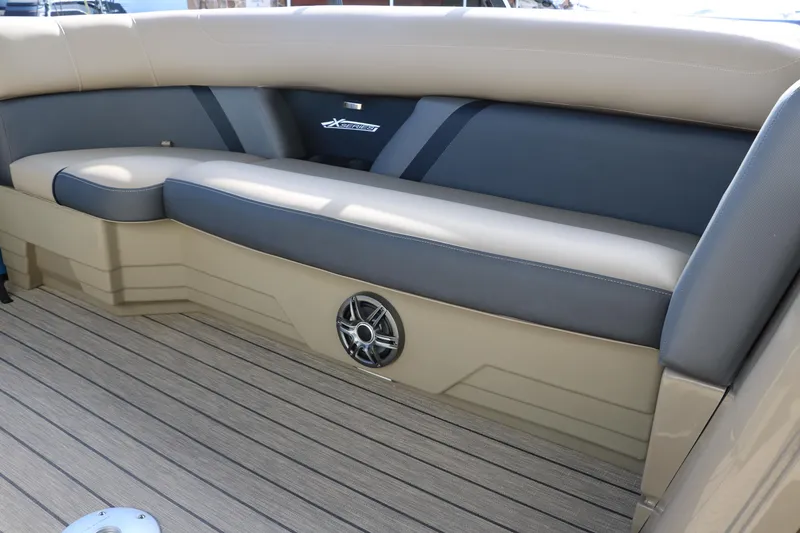 Slide: The Image of 2025 Sylvan Mirage X3 Party Fish boat interior seating with speaker. - 34