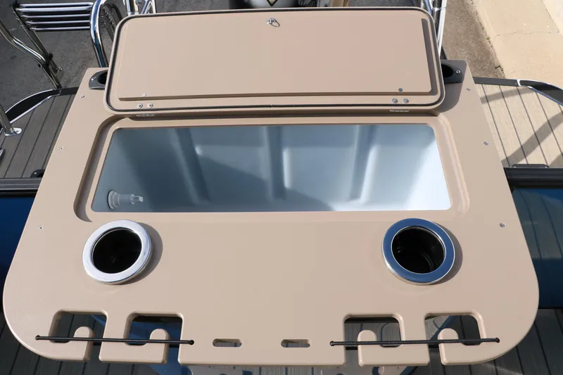 Slide: The Image of 2025 Sylvan Mirage X3 Party Fish boat with open storage compartment and cup holders. - 38