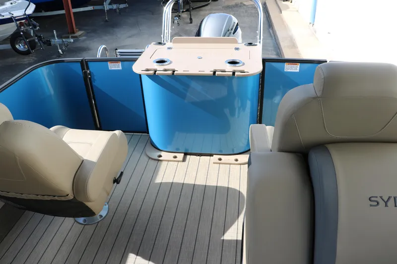 Slide: The Image of 2025 Sylvan Mirage X3 Party Fish boat interior with seating and table. - 39