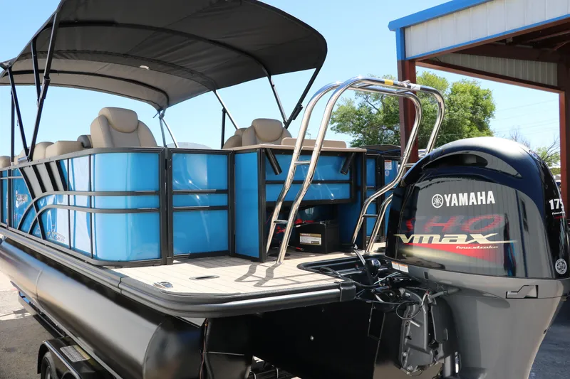 Slide: The Image of 2025 Sylvan Mirage X3 Party Fish pontoon boat with Yamaha VMAX engine. - 4