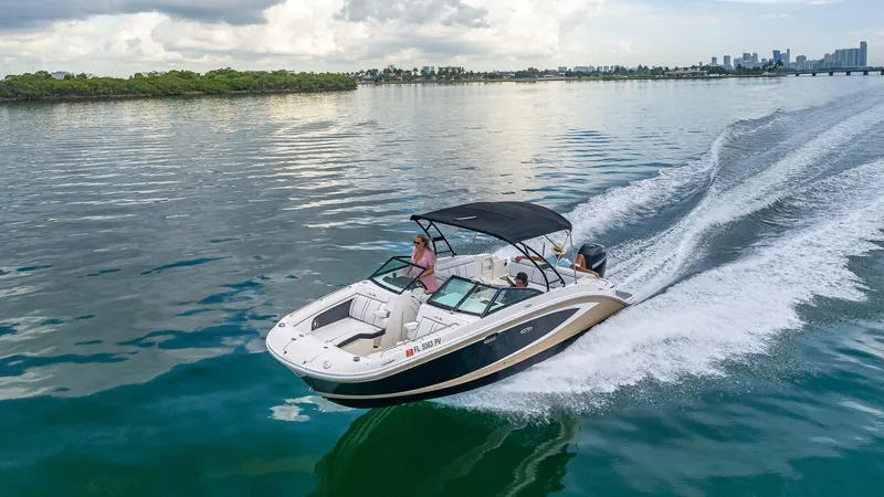 Slide: The Image of 2015 Sea Ray SDX 270 cruising on a calm lake. - 2