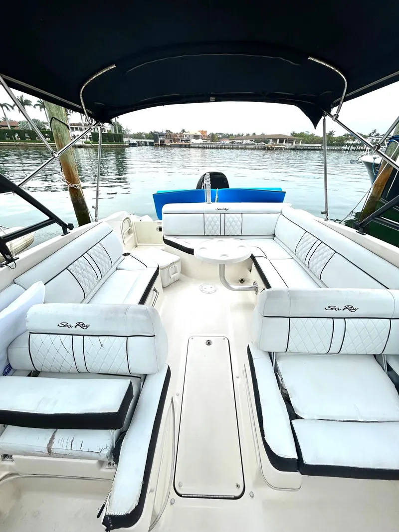 Slide: The Image of 2015 Sea Ray SDX 270 boat with spacious seating and waterfront view. - 30