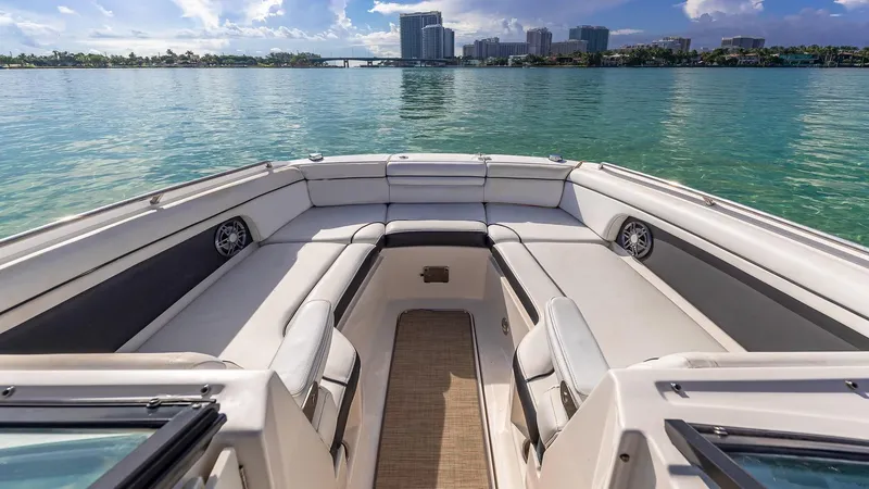 Slide: The Image of 2015 Sea Ray SDX 270 boat interior with waterfront cityscape. - 5