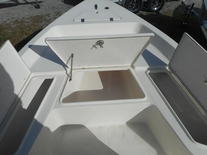 Slide: The Image of 2024 Bulls Bay 2000 boat storage compartments open. - 10