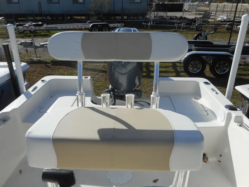 Slide: The Image of 2024 Bulls Bay 2000 boat with beige and white seating. - 12